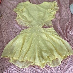 Lucy in the sky yellow backless romper size S